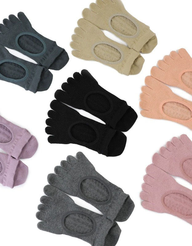 Set of toe separators in various colors on a white background
