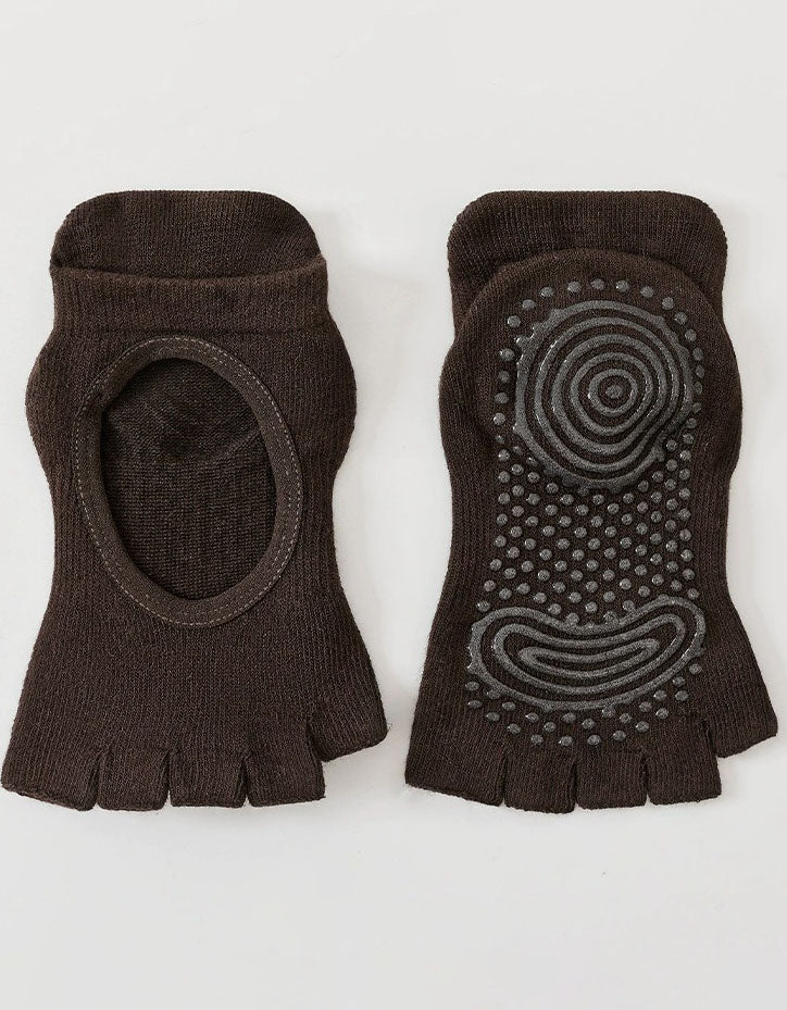 Pair of brown toe-separated socks with textured sole on a white background