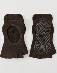 Pair of brown toe-separated socks with textured sole on a white background