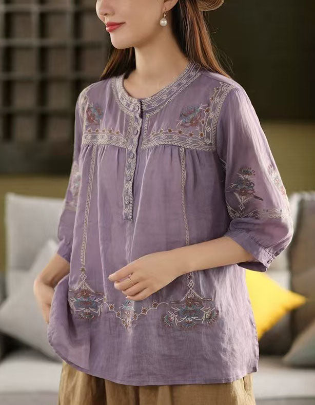 Side view of purple bohemian embroidered cotton blouse with vintage vibe