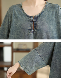 Close-up of neckline detail on women’s denim maxi dress casual wear