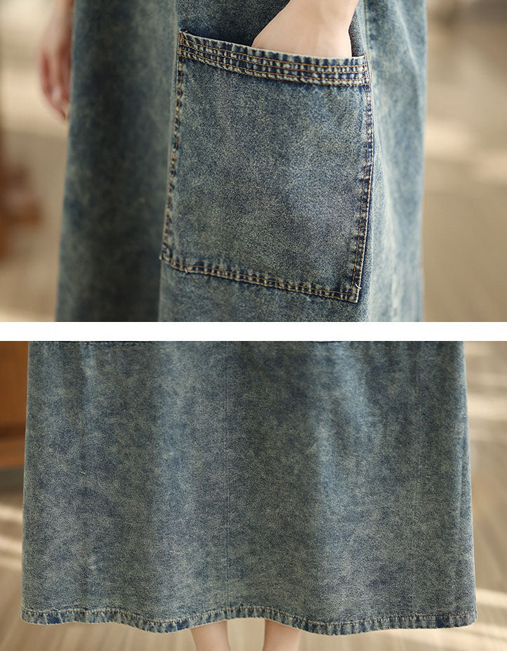 Close-up of front pockets on women’s denim maxi dress
