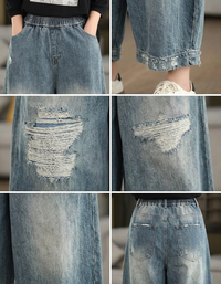 Vintage washed wide leg jeans ripped detail close up