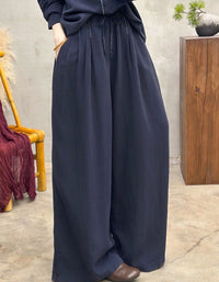Women’s navy linen pants, wide-leg style with drawstring waist, perfect for casual, breathable summer fashion