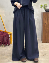 Women’s navy linen pants with drawstring waist, wide-leg style, lightweight breathable fabric perfect for casual wear and everyday comfort