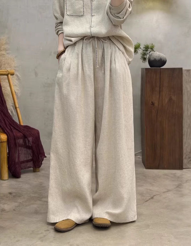Women’s light beige linen pants with drawstring waist, wide-leg relaxed fit, breathable casual trousers for everyday wear