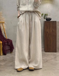 Women’s light beige linen pants with drawstring waist, wide-leg relaxed fit, breathable casual trousers for everyday wear