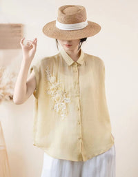 Women’s embroidered sleeveless linen blouse button down front view