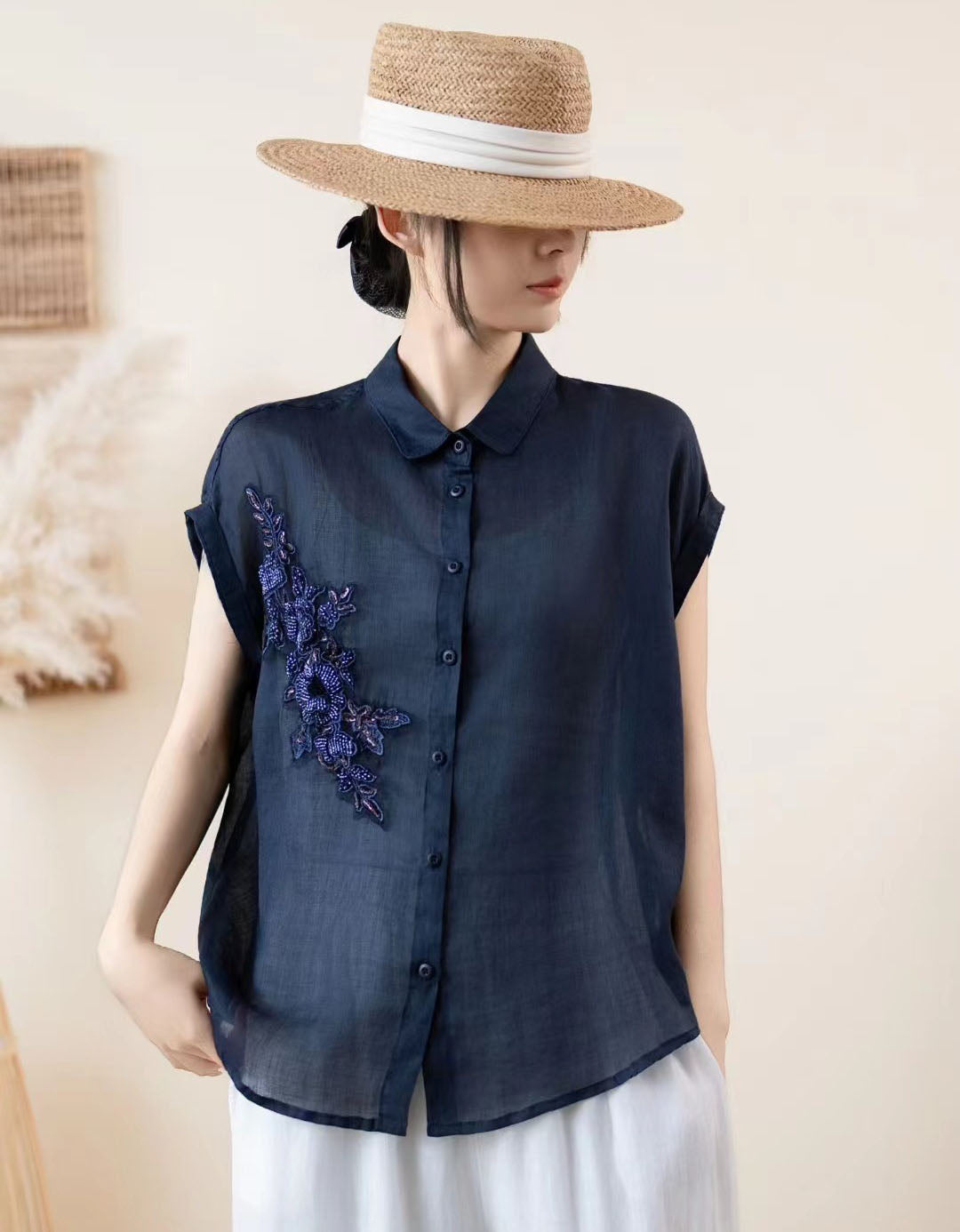 Casual summer blouse with floral embroidery detail