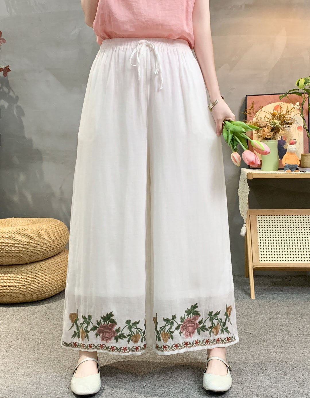 High waist embroidered wide leg linen trousers with boho floral border design.