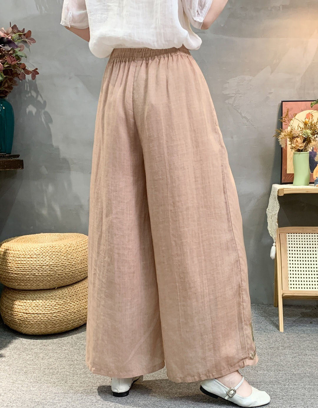 High waist embroidered wide leg linen trousers with boho floral border design back view
