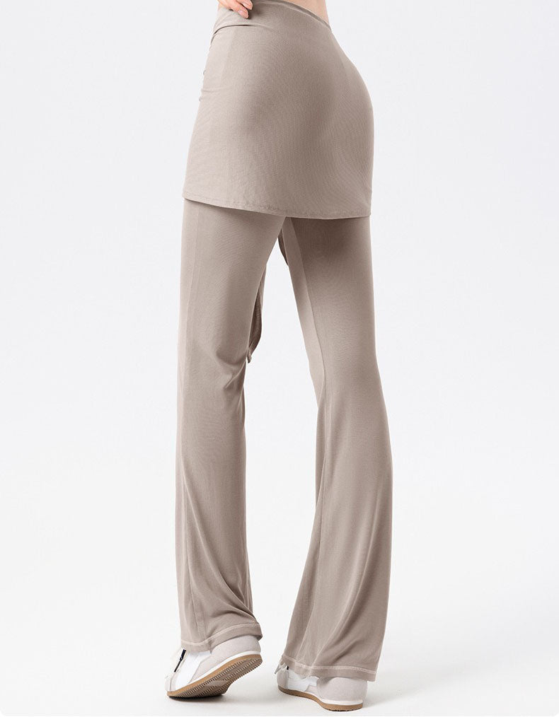 Women wearing high waist flare yoga pants with wrap tie