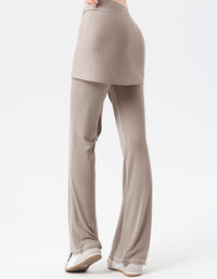 Women wearing high waist flare yoga pants with wrap tie