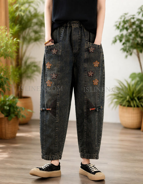 Women’s denim jogger pants with flower embroidery on pockets