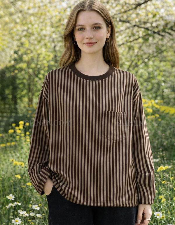 Front view of women’s cotton striped blouse with pocket