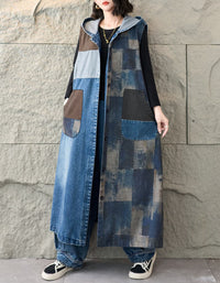 Full view of women’s oversized hooded denim maxi dress styled casually