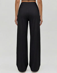 Black high waist wide leg pants for women with relaxed fit and minimalist style
