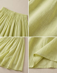 Close-up of smocked elastic waistband on lime green linen maxi skirt