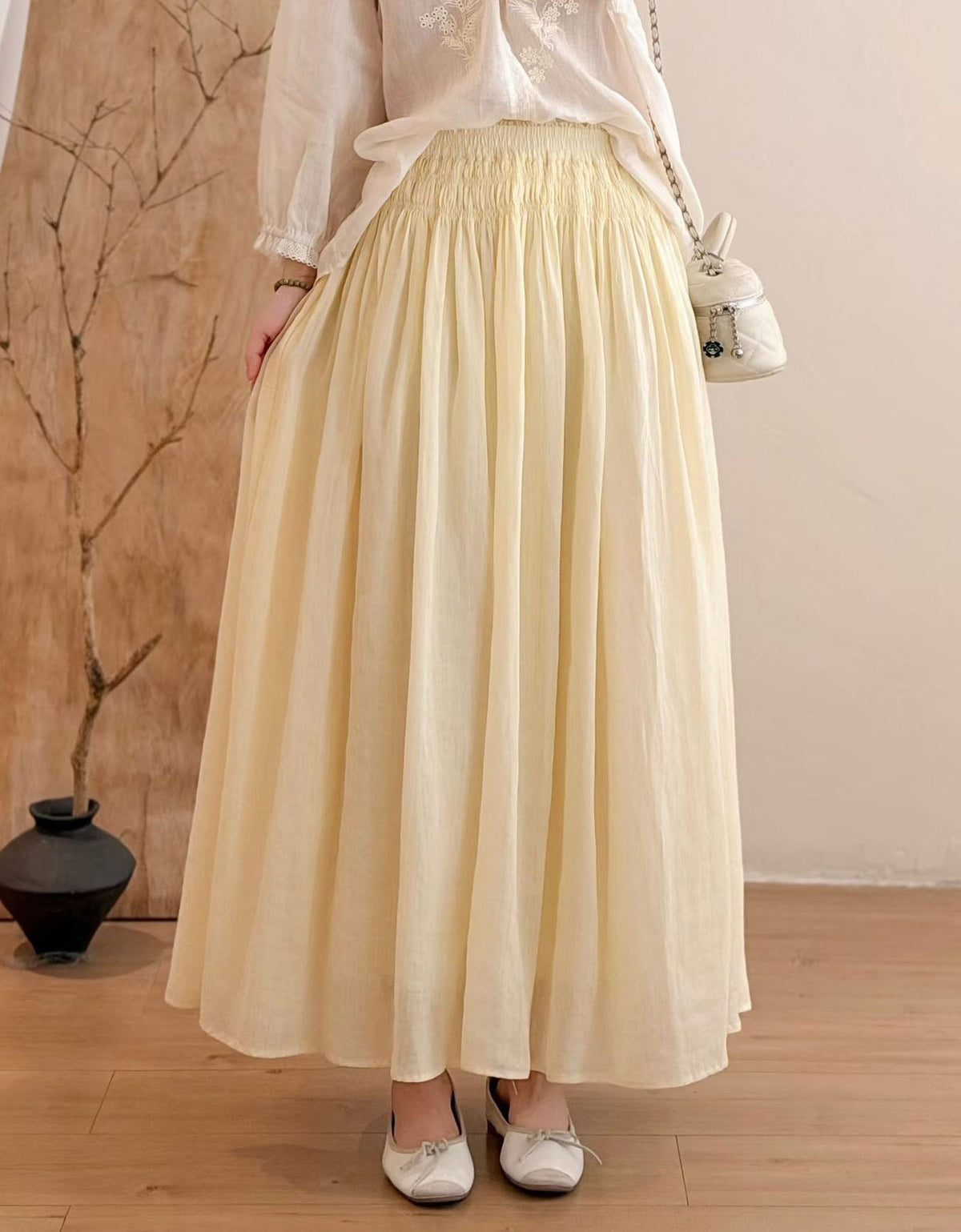 Casual women’s bohemian maxi skirt paired with minimalist shoes
