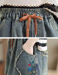 Mid-length vintage denim skirt with relaxed fit and drawstring