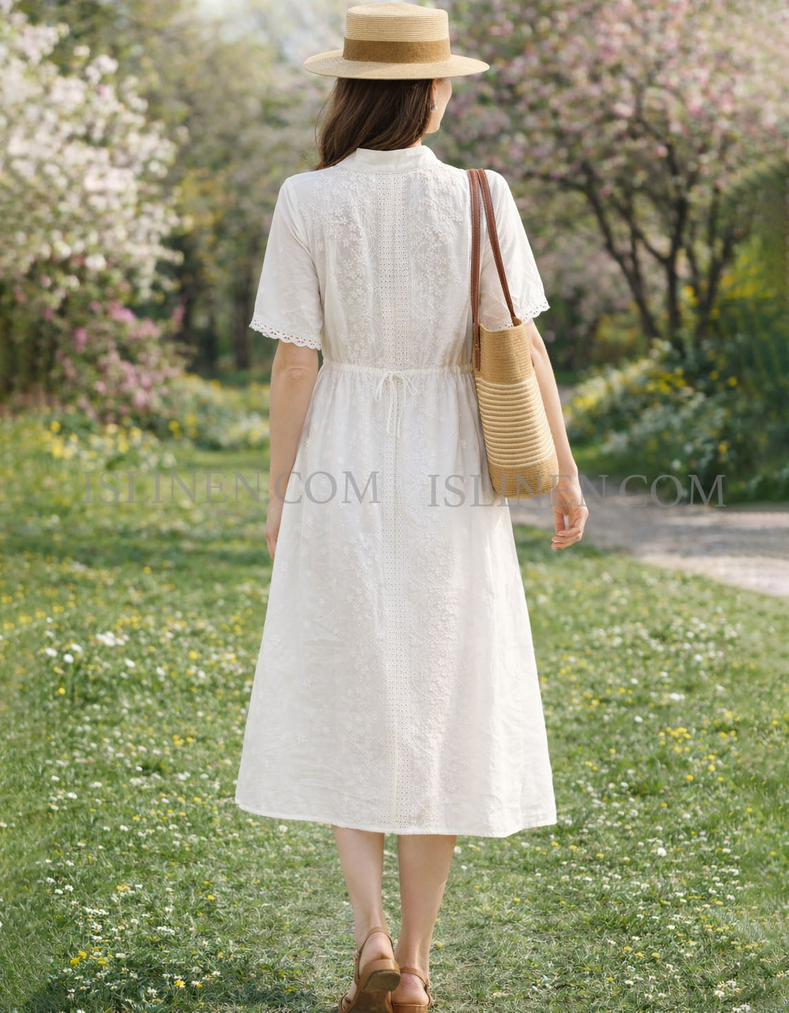 Bakc view of bohemian white embroidered dress lifestyle photo
