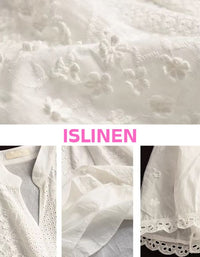 Close-up lace embroidery detail on white dress