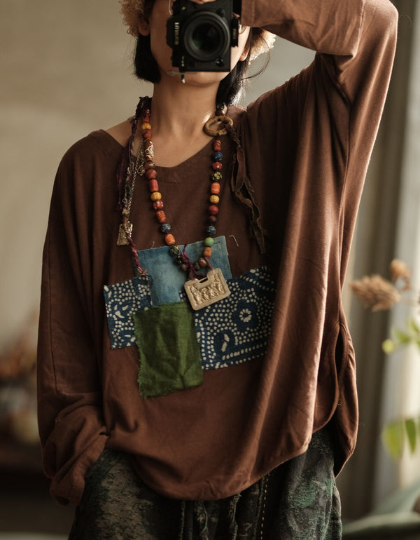 Front view of casual women’s patchwork shirt with vibrant colors