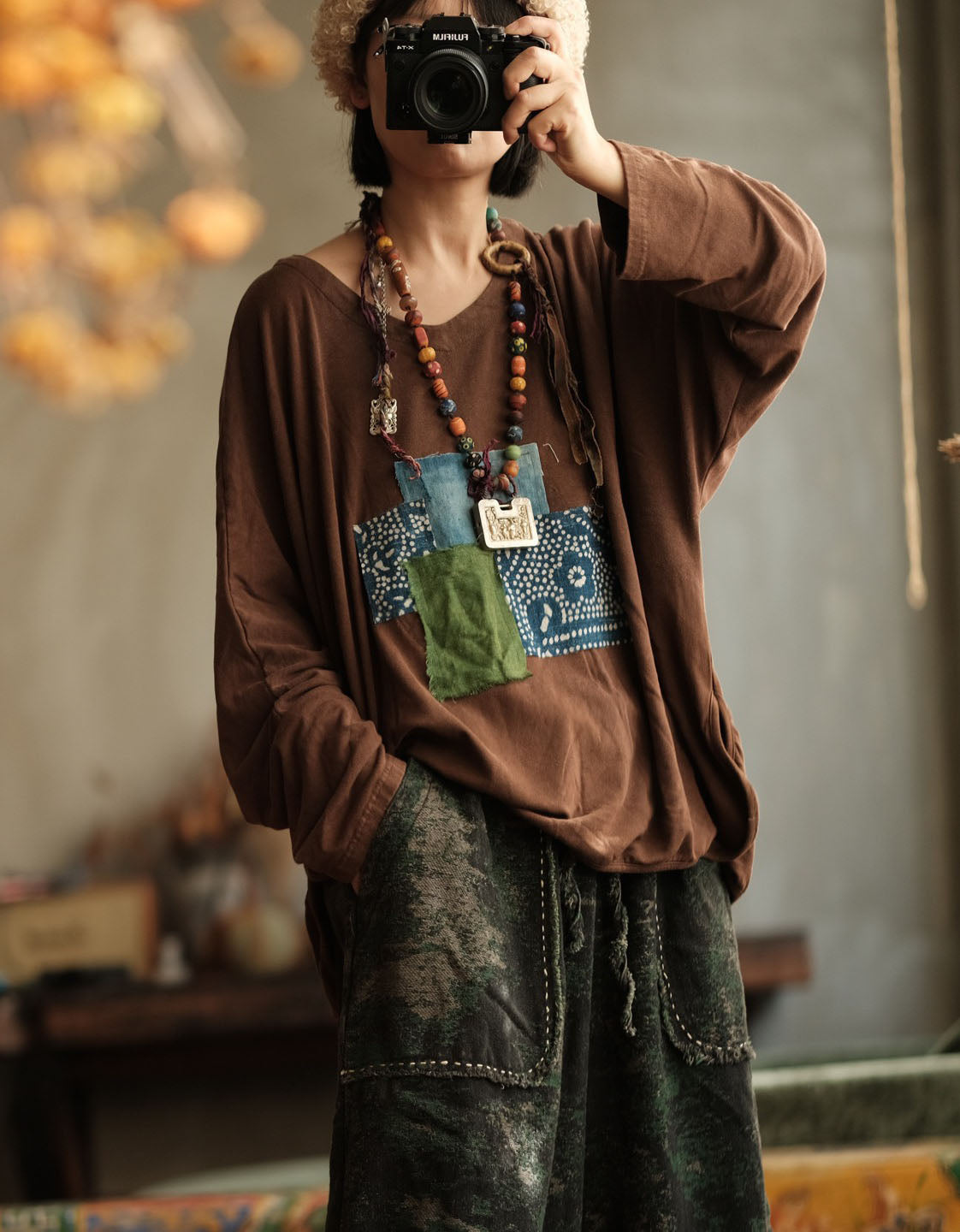 Stylish boho long sleeve shirt with colorful fabric patches