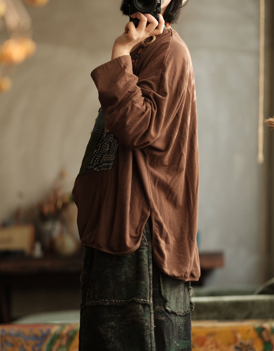 Relaxed fit women’s shirt with unique patchwork and beads side view