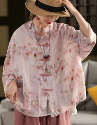 Alt text:
Women’s pink floral linen blouse with button closure, relaxed fit breathable fabric, ideal for comfortable everyday wear