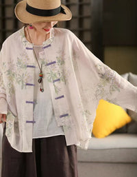 Side view of women’s beige floral linen blouse with button details, lightweight breathable fabric, perfect for summer and casual daywear