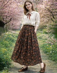 Full view of women floral print long skirt in outdoor setting