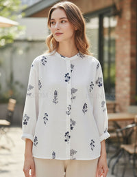 Vintage floral embroidered linen button down shirt women front view