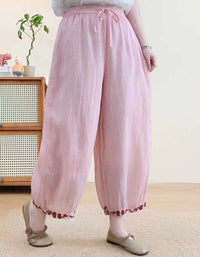 Vintage style balloon linen pants for women with relaxed fit and ankle embroidery