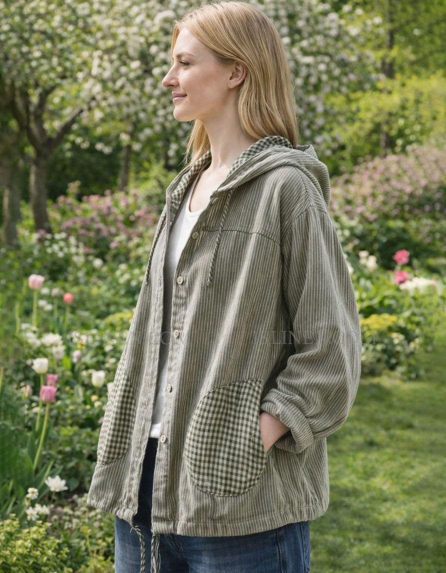 Model Wearing Striped Hooded Jacket in Casual Setting