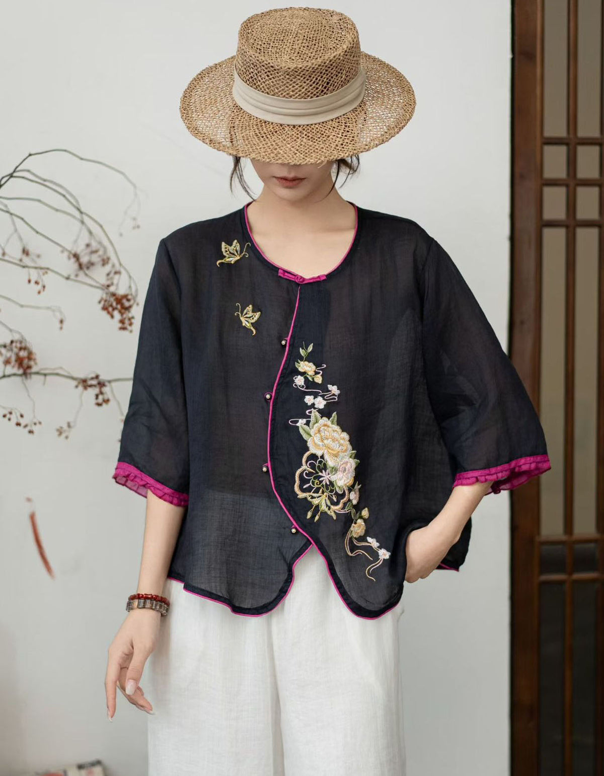 Women embroidered linen blouse loose fit pink front view