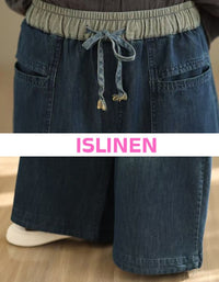 close-up of drawstring waist on wide leg denim pants women