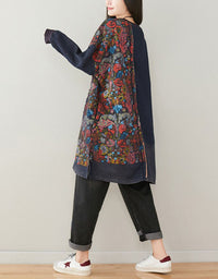 Side view of boho denim tunic top styled with cuffed jeans and sneakers