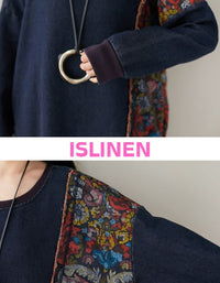 Close up of floral patterned panel on women’s oversized denim tunic