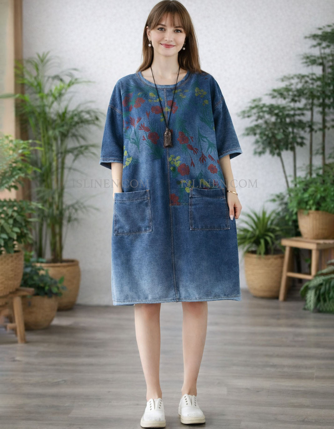 Floral pattern on women’s denim dress with a relaxed fit