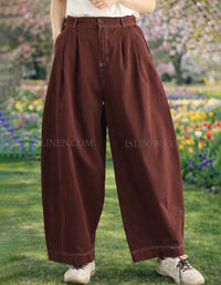 Women wearing high waist wide leg linen pants wine red