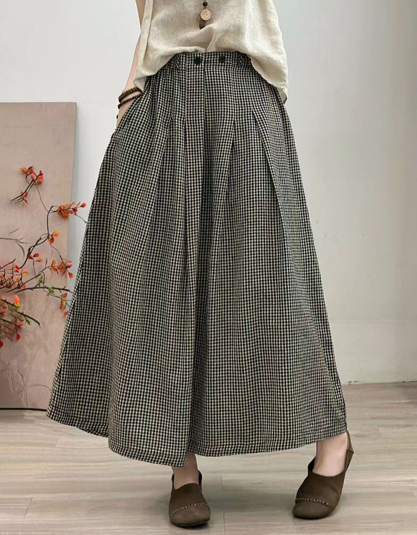 Plaid pleated midi skirt with high waist and loose fit design for women