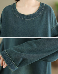 Close-up of the neckline on women’s relaxed fit denim top, casual style