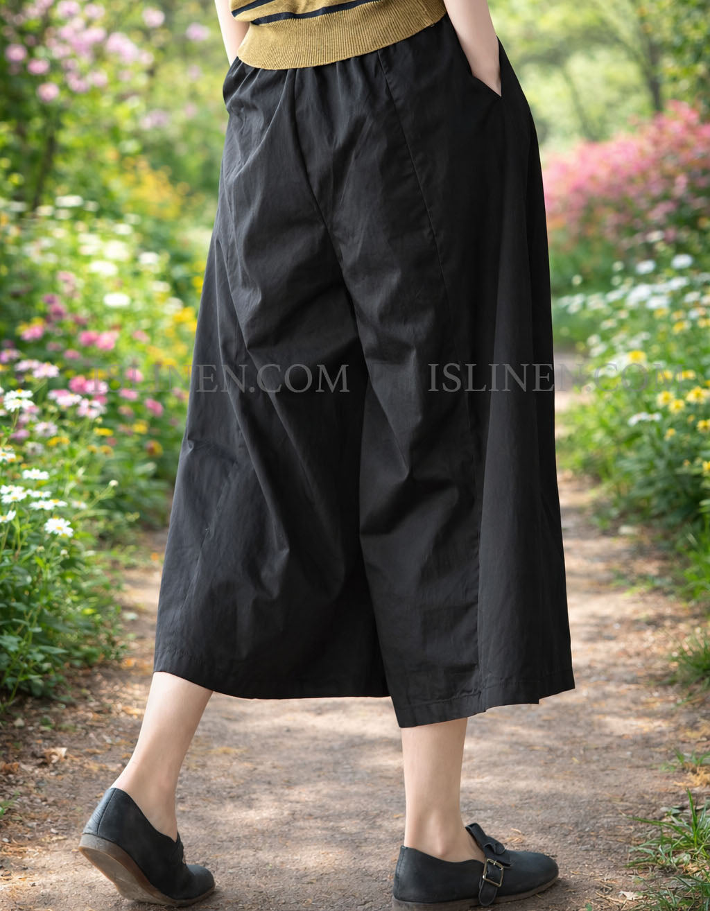 Back view of wide leg culotte pants lifestyle outdoor photo