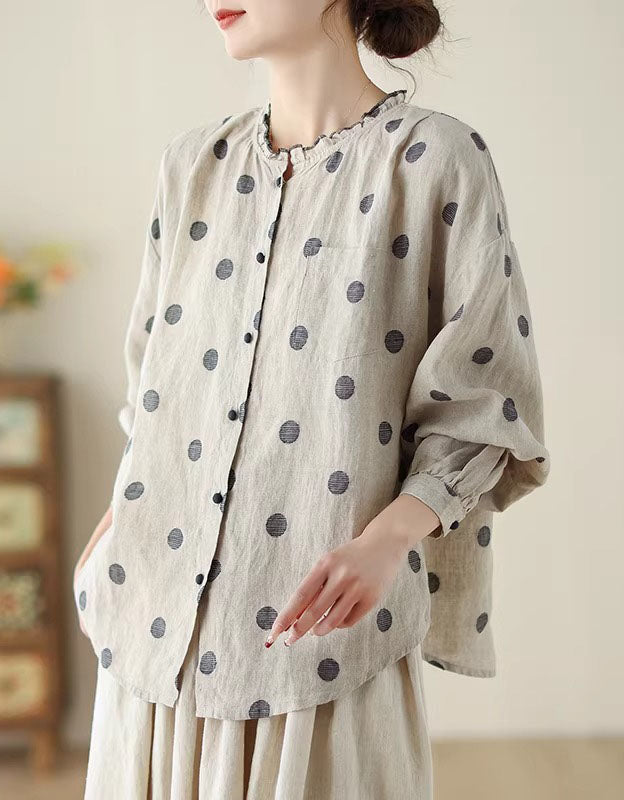 Casual and comfortable women’s polka dot blouse with a round neckline side view