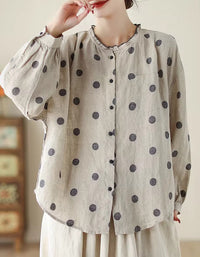Casual and comfortable women’s polka dot blouse with a round neckline
