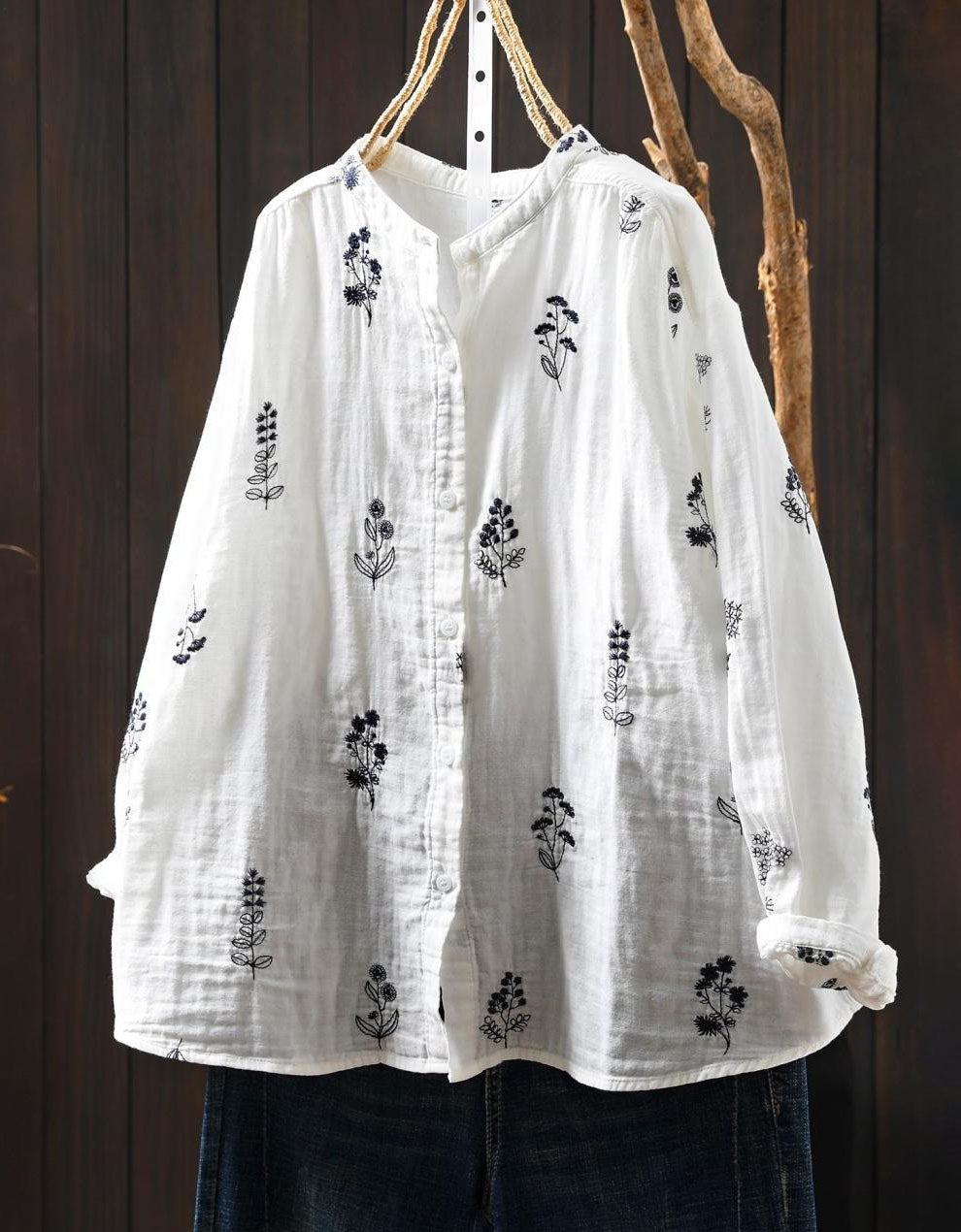 Boho floral embroidery detail on women linen shirt