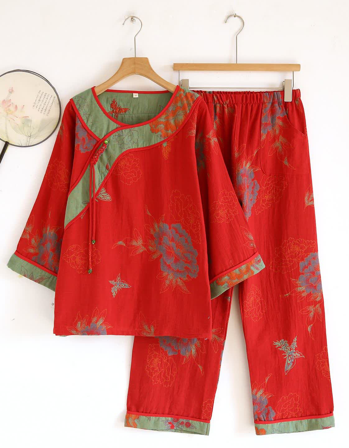 Women’s floral embroidered two-piece set, casual outfit with top and pants in red with elegant floral design