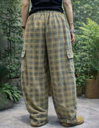 Green plaid wide leg cargo pants, relaxed fit back view.