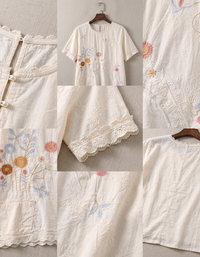 Vintage embroidered blouse colorful floral detail close up